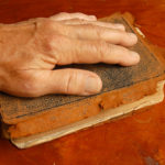 hand on bible